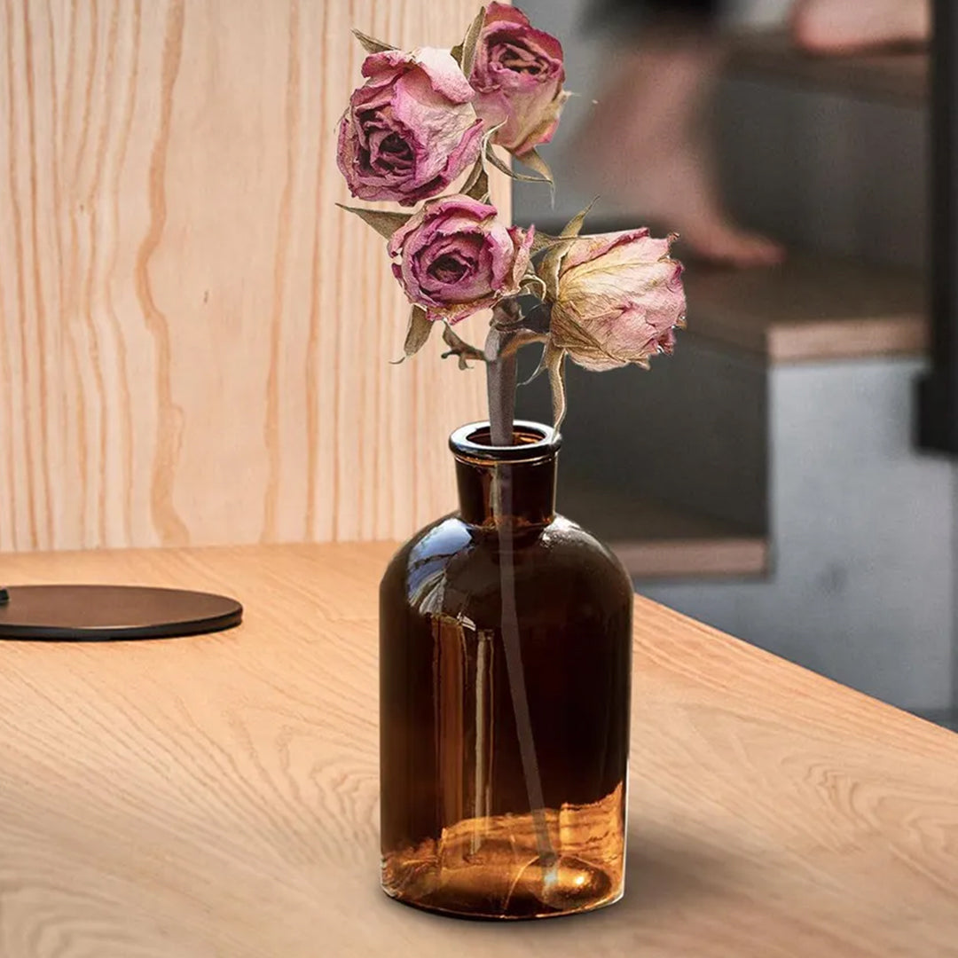 Botella de vidrio ámbar con corcho