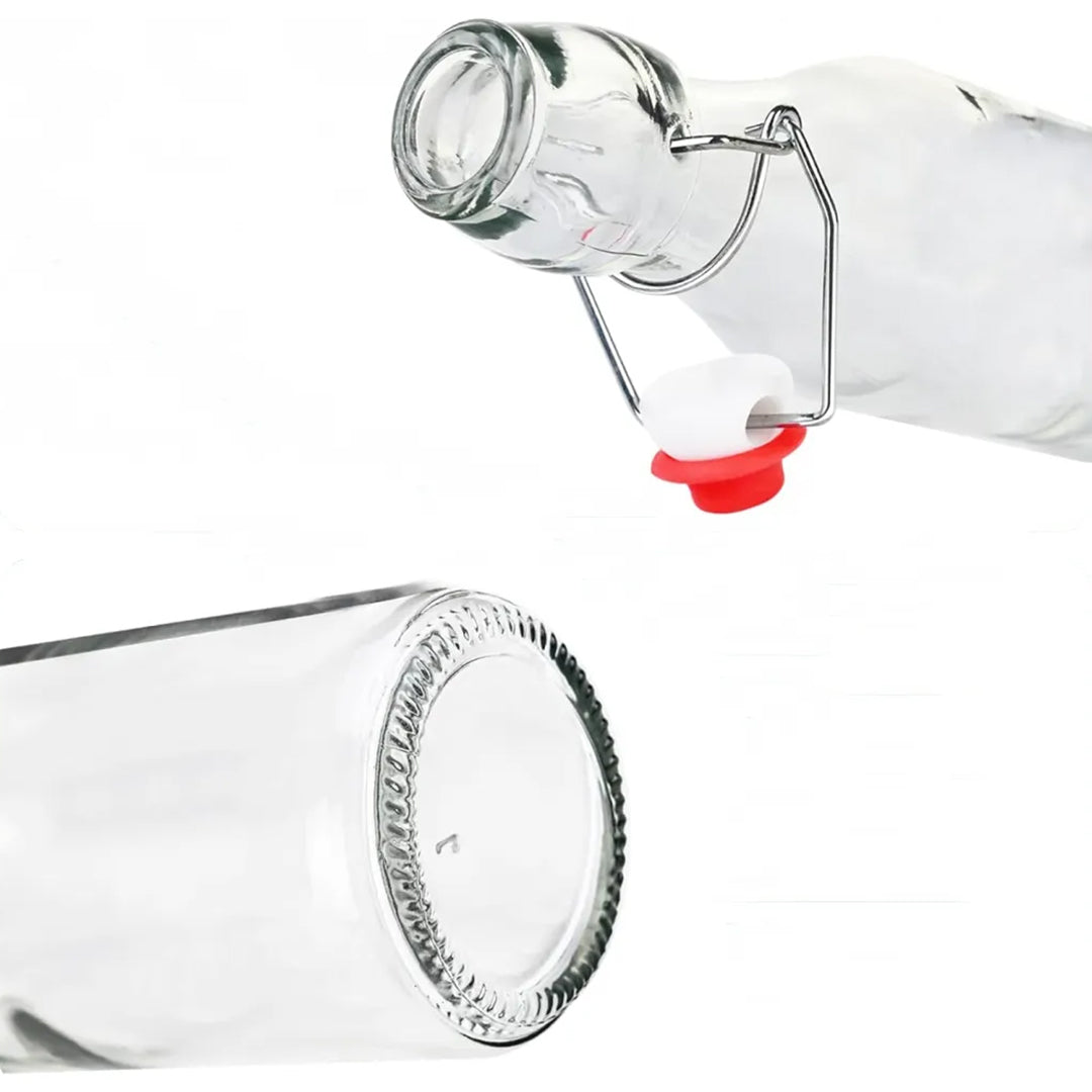 Botella de vidrio con tapa abatible