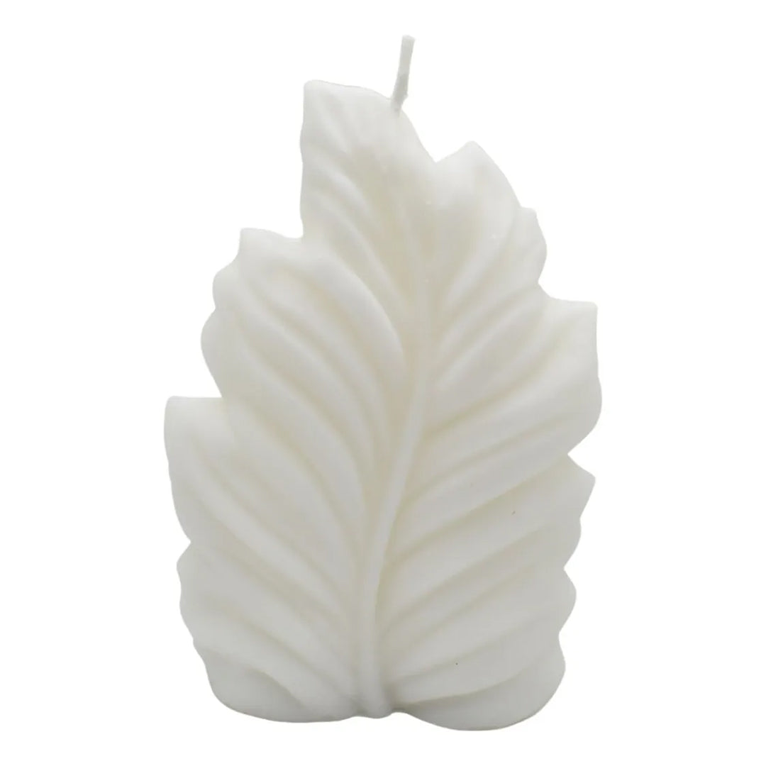Vela blanca con forma de hoja de palma